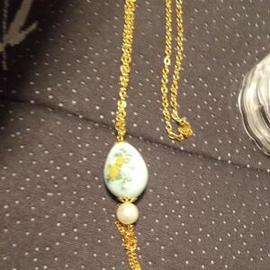 Elegant Gold and White Floral Pendant Necklace